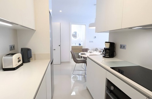 Torrevieja Apartment | Villa 'R-60-A Maestro' with Shared Pool, Wi-Fi and Air Conditioning