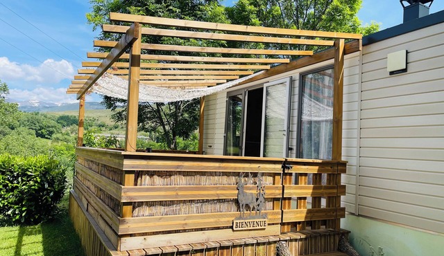 4-person mobile home in a family campsite in the mountains
