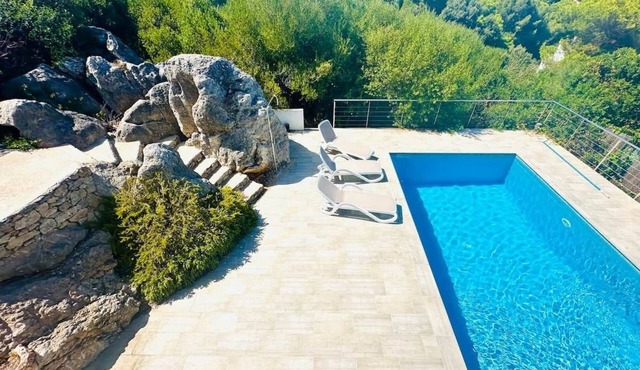 A stunning 4-bedroom home with swimming pool in Puerto Addaia, Menorca.