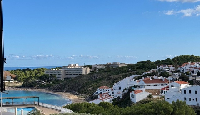 Apartment 'Dreams Of Menorca' with Sea View, Shared Pool, and Wi-Fi