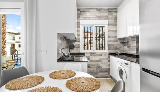 Apartment 'Punta Prima Palm Beach' with Shared Pool, Balcony and Wi-Fi