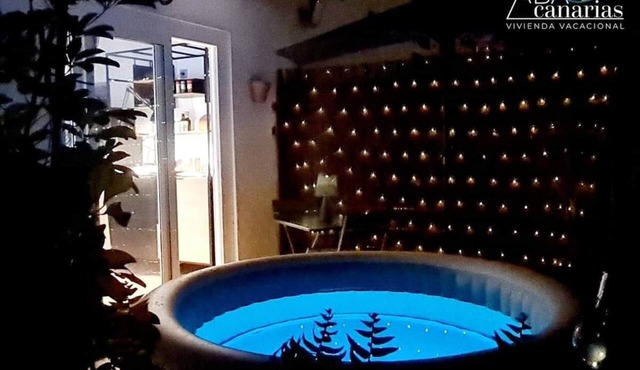 Apartment with independent entrance, covered patio, outdoor jacuzzi and garden