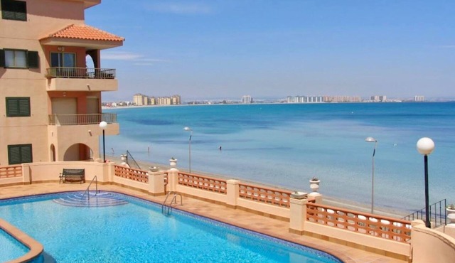 Beachfront 3BR Condo w Pool Views Sleeps 10