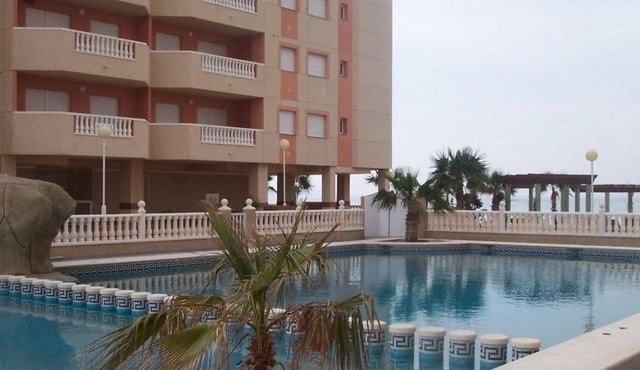 Beachside Apartment with Pool, Terrace & Parking, 2-BR, La Manga, Pets Allowed