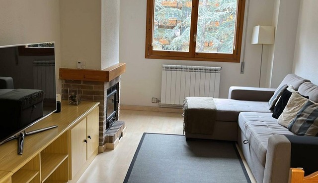 Central Apartment in Jaca with Pool, Terrace, and Covered Parking