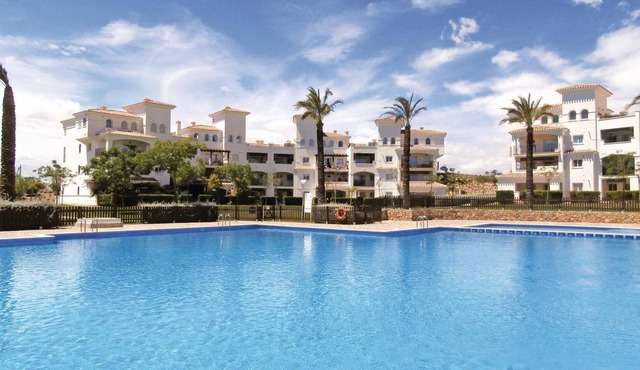 Charming vacation apartment with open, sunny terrace with pergola.