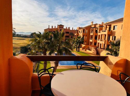 Deluxe 2-bedroom apartment with superb golf views & pool