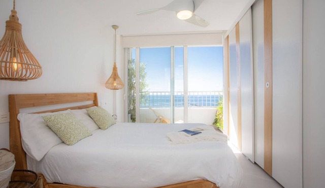 Experience the ultimate summer escape in this exclusive designer retreat, meticulously crafted for those seeking to disconnect in total style by the sea. Available from June to September, this apartment stands out for its bright, avant-garde interior whe