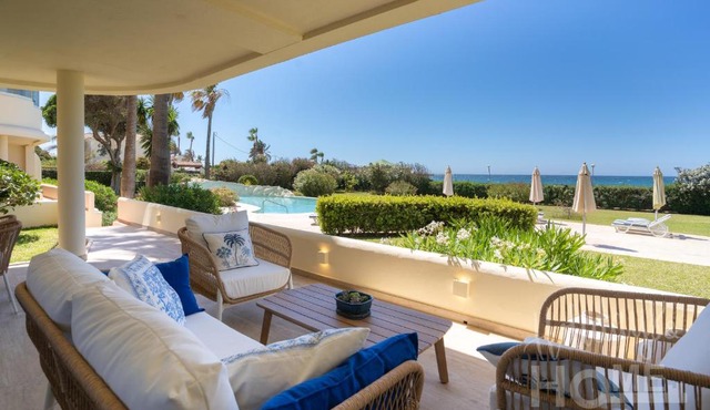 Holidays & Home Beachfront Neptuno III , sea views,and garden,Elviria