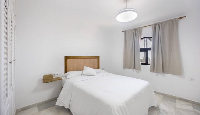 Isla Verde 2: Seaside Retreat Amid Green Surroundings