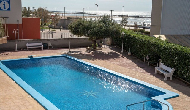 Lovely apartment for 4 guests with A/C, WIFI, pool, TV and balcony