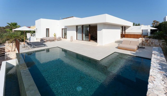 Luxury villa with pool and private beach access