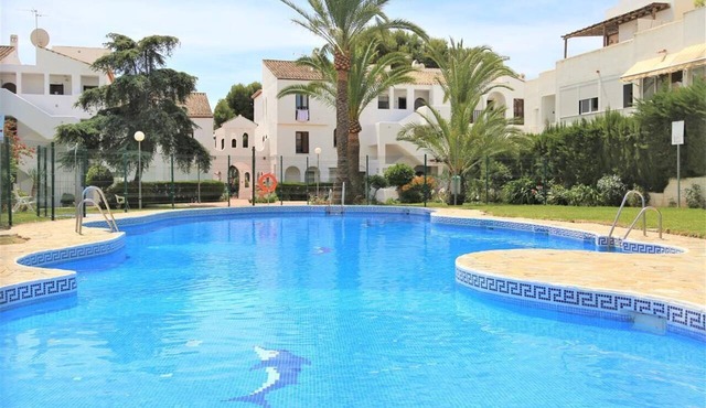 Penthouse apartment with pool, aircon and terrace, Close to cafes, bars, restaurants and the beach