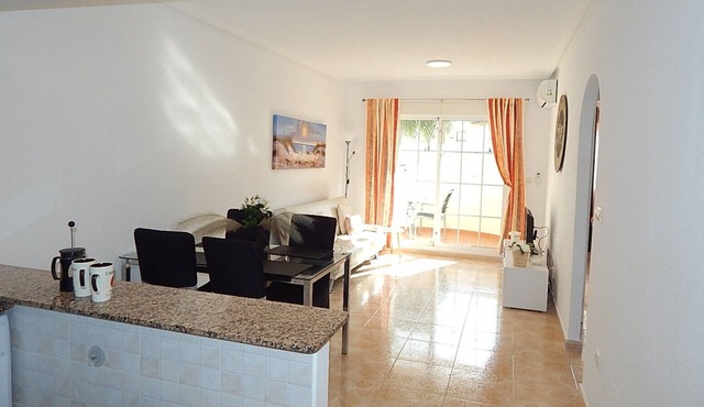 Prime location for Villamartin Plaza, overlooking communal pool