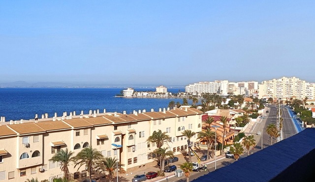 Sea view apartment with communal pool