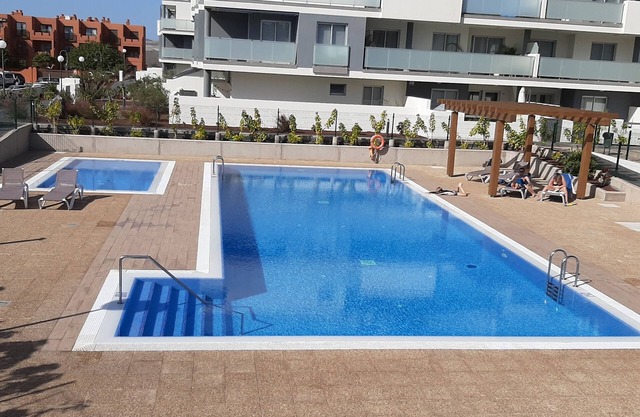 BEAUTIFUL MODERN APARTMENT WITH HEATED POOL !