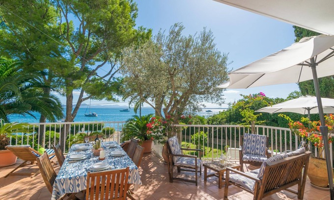 Alcanada House | BELL-PUNT - Comfy seafront beach house with private terrace and garden. Free WiFi