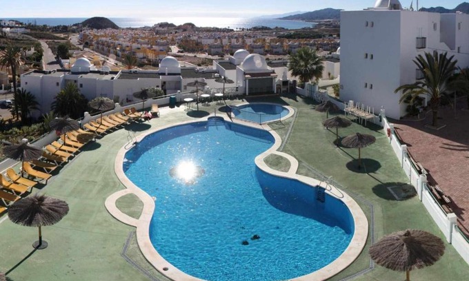 Pulpi Apartment | Estrelitzia apartamento con vista panorámica al mar y piscina comunitaria