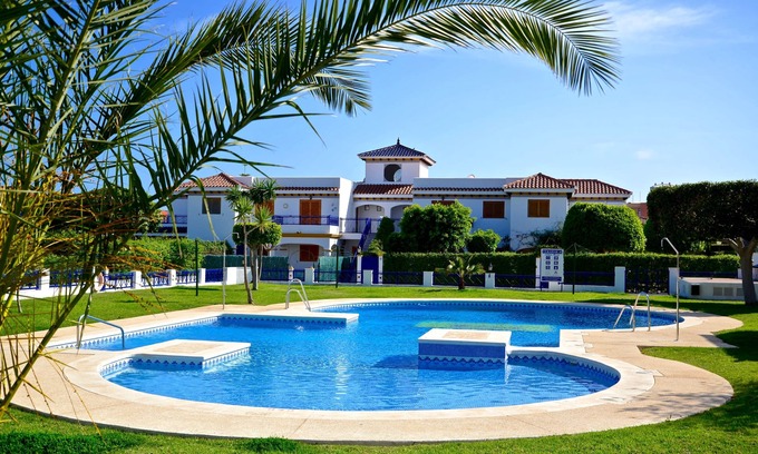 Vera Beach Apartment | Living room with balcony and sea view, waterfront and south-facing