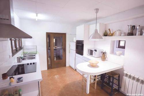 Photo of Kitchen in Maia de Montcal