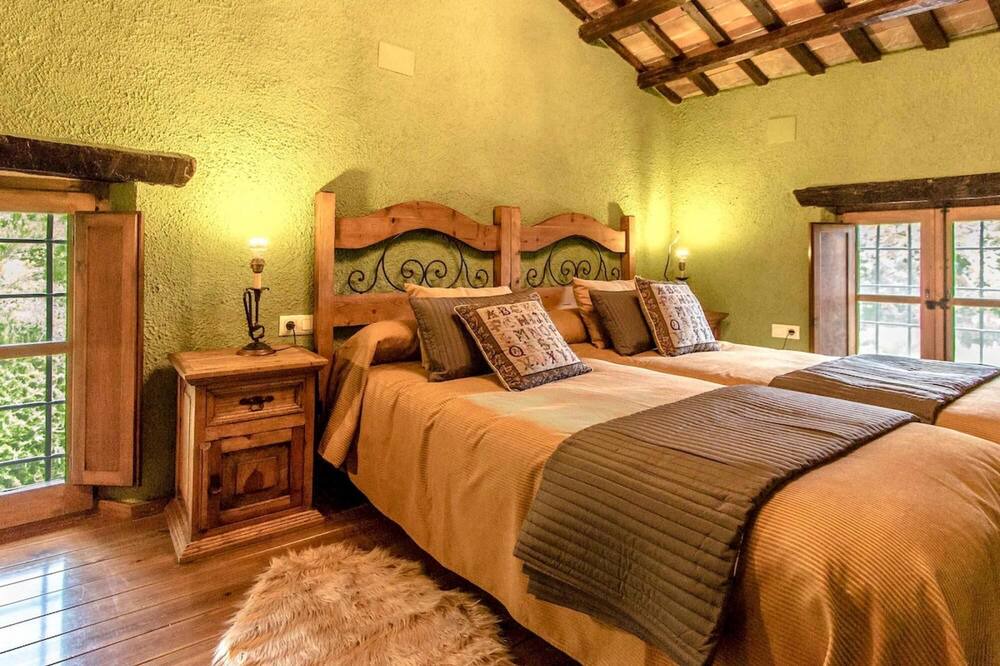 Photo of Bedroom in Sant Feliu de Buixalleu