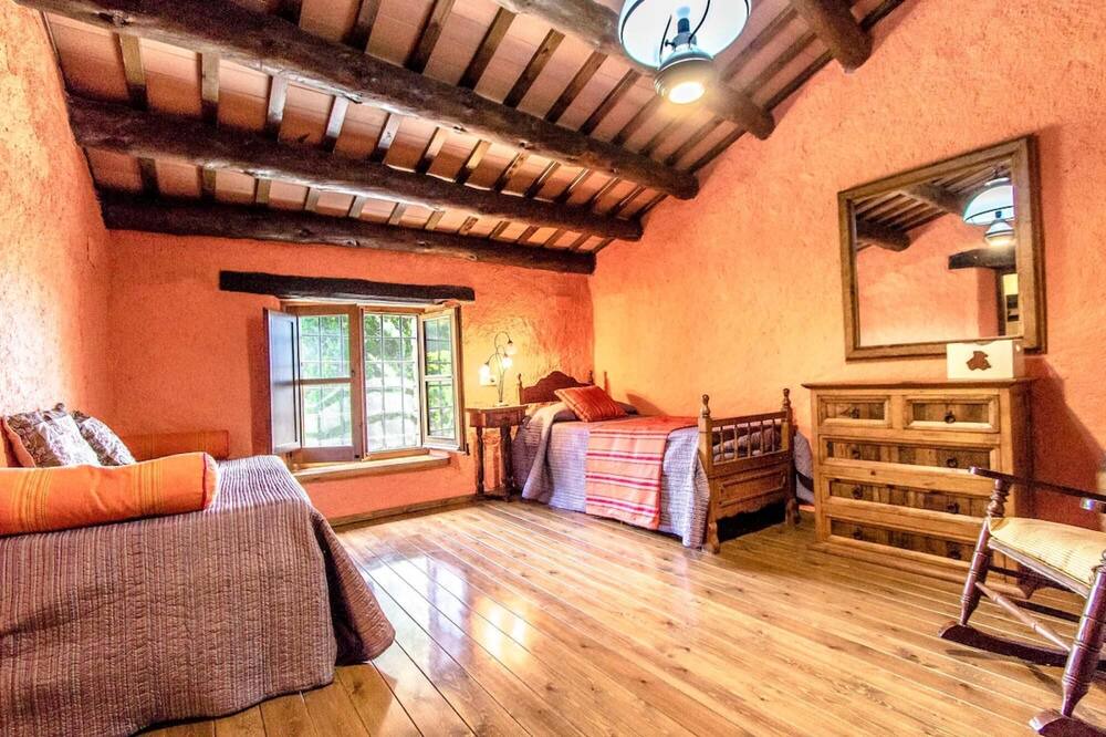 Photo of Bedroom in Sant Feliu de Buixalleu