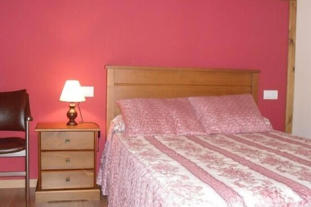 Photo of Bedroom in Llamigo