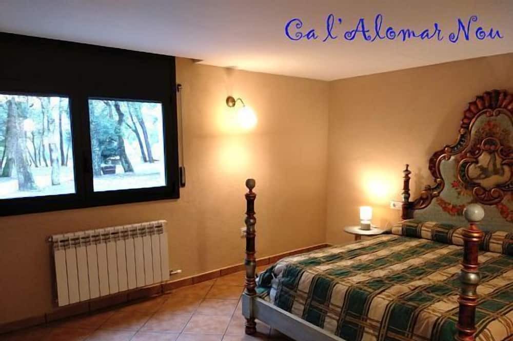 Photo of Bedroom in Sant Feliu de Buixalleu