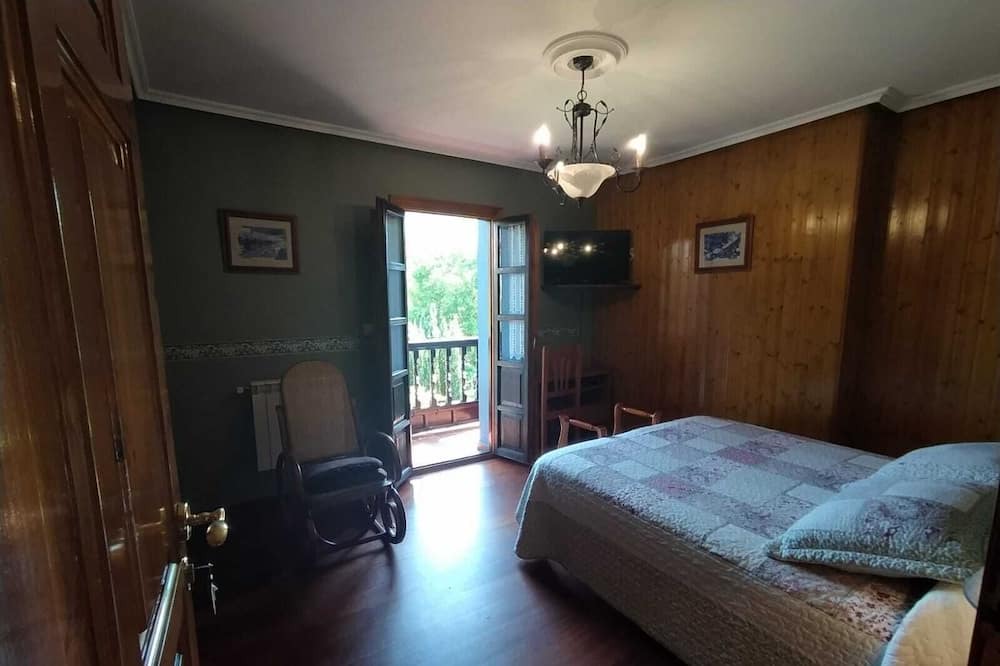 Photo of Bedroom in Llamigo