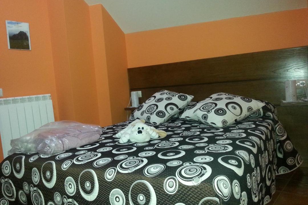 Photo of Bedroom in Santa Cruz de los Cuerragos