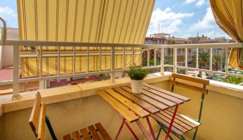 Three-Bedroom Apartment with Balcony