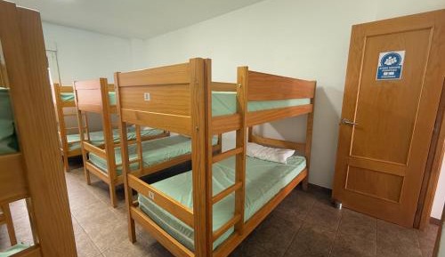 Single Bed in Dormitory Room