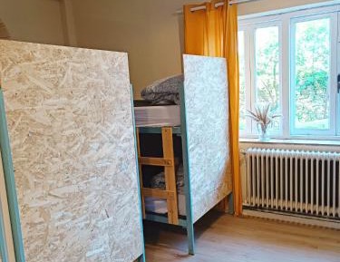 Single Bed in Dormitory Room