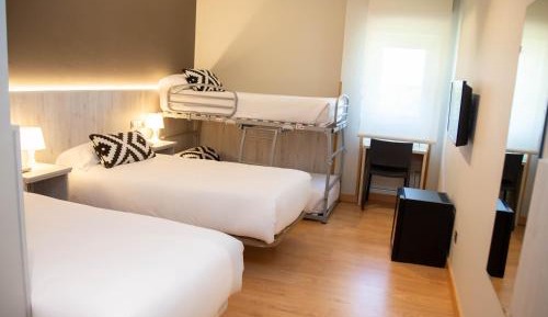 Quadruple Room (2 Adults + 2 Children)