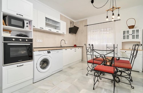 Benajarafe Apartment | Apartment 'Adosado Con Piscina Benajarafe' with Balcony, Wi-Fi and Air Conditioning